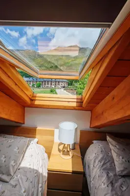 Zona de estar de Apartment Aüt 3 Dachgeschosswohnung in Vall de Boí by Interhome