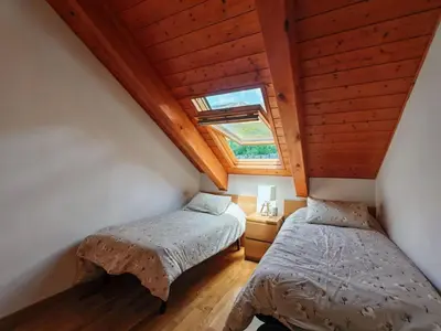 Cama o camas de una habitación en Apartment Aüt 3 Dachgeschosswohnung in Vall de Boí by Interhome