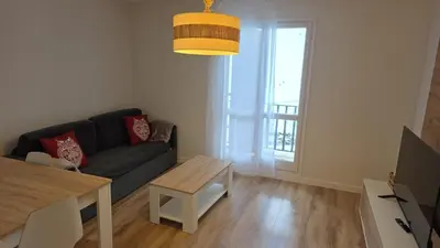 Una televisión o centro de entretenimiento en Apartamentos Leyre Candanchú