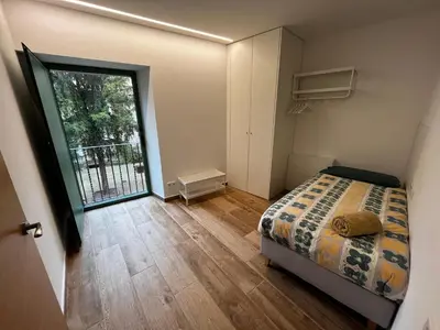 Cama o camas de una habitación en Cal Ganiveter