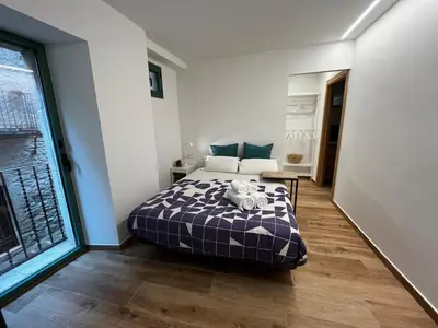 Cama o camas de una habitación en Cal Ganiveter