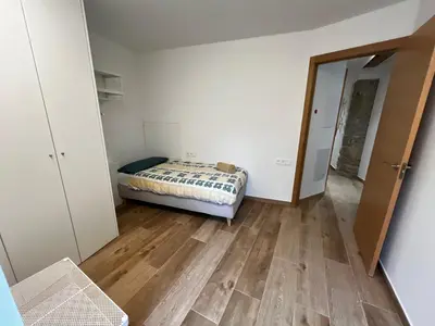 Cama o camas de una habitación en Cal Ganiveter