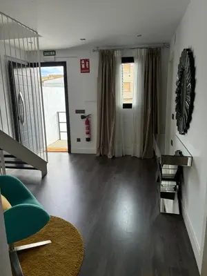 Una televisión o centro de entretenimiento en IRUÑA vivienda turistica