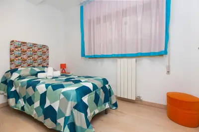 Cama o camas de una habitación en El rincón de las Delicias