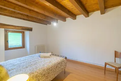 Cama o camas de una habitación en Amplia casa rural ideal para familias y grupos