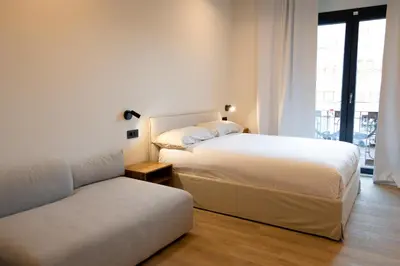 Cama o camas de una habitación en Salon Suites