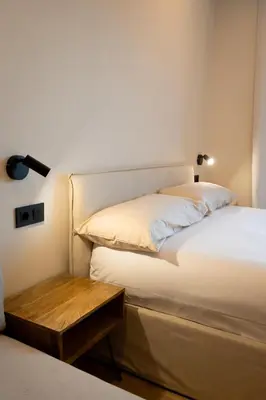 Cama o camas de una habitación en Salon Suites