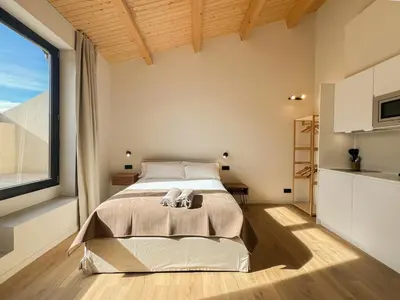 Cama o camas de una habitación en Salon Suites