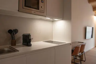 Una cocina o zona de cocina en Salon Suites