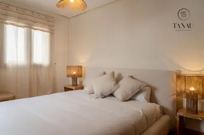 Cama o camas de una habitación en Tanau Rentals - TKS