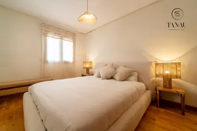 Cama o camas de una habitación en Tanau Rentals - TKS