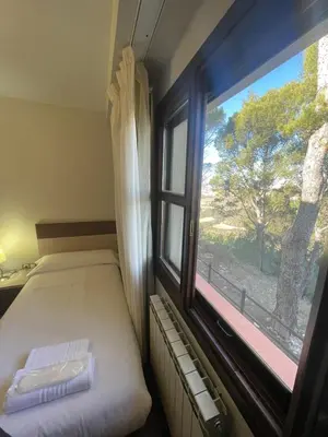 Cama o camas de una habitación en Hotel Santuario de Sancho Abarca
