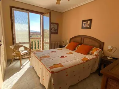 Cama o camas de una habitación en Maravillosa casa con piscina en un pueblo único, Artajona - Navarra