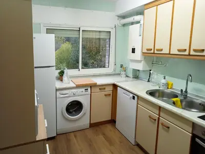 Una cocina o zona de cocina en Apartamentos Valle de Tena - Biescas 3000
