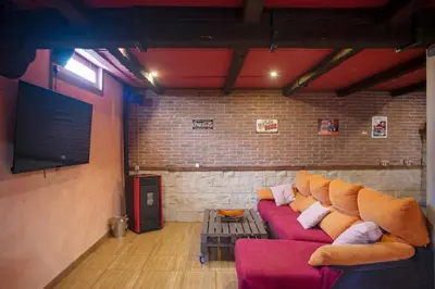 Una televisión o centro de entretenimiento en Casa Melchor