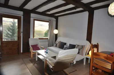 Zona de estar de Apartamentos Tirol