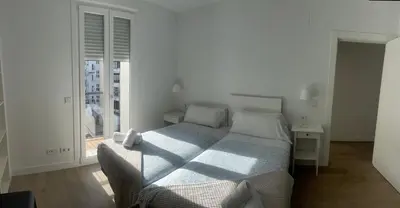 Cama o camas de una habitación en Apartaments Plaza Príncipe Viana