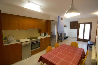 Una cocina o zona de cocina en Apartamentos Turisticos Rio Gallego