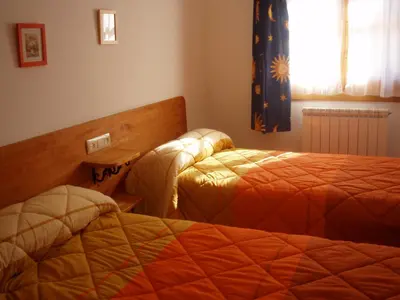 Cama o camas de una habitación en Apartamento Lamatriz Dequin Edificio Sayo 8