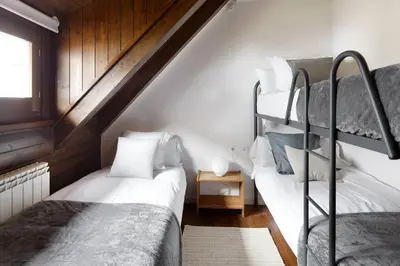 Cama o camas de una habitación en Stadium by FeelFree Rentals