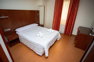 Cama o camas de una habitación en Hotel Villa De Cárcar