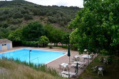 Piscina en o cerca de Masia Molí de Tartareu