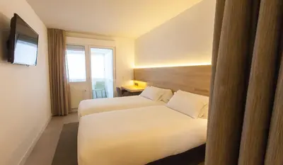 Cama o camas de una habitación en Hotel A Pamplona