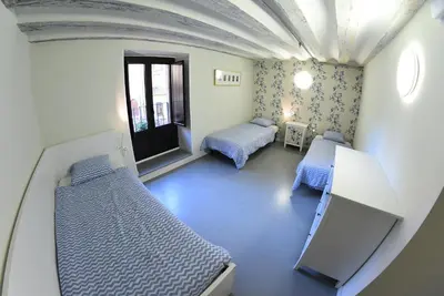Cama o camas de una habitación en Plaza Catedral hostel