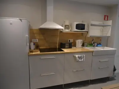 Una cocina o zona de cocina en Plaza Catedral hostel