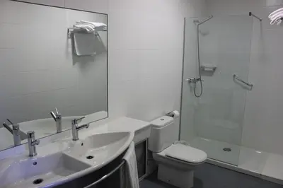 Un baño de Apartamentos Irati