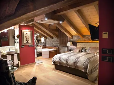 Cama o camas de una habitación en Aparta-Hotel Puertolas
