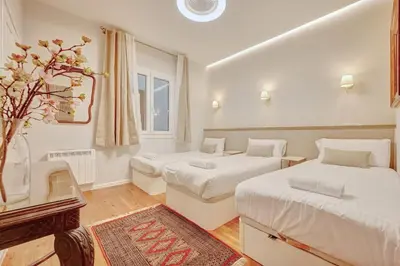 Cama o camas de una habitación en Heart of Pamplona Apartments III by clabao