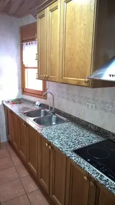 Una cocina o zona de cocina en La Perxada de Besolí