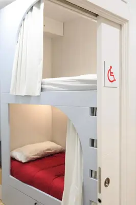 Cama o camas de una habitación en Albergue de Pamplona-Iruñako