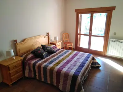 Cama o camas de una habitación en Albergue Casa Salinas