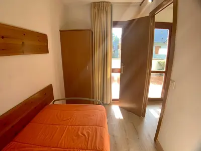 Cama o camas de una habitación en Apartamentos Los Lagos