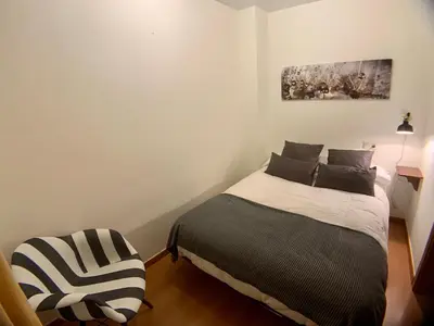 Cama o camas de una habitación en Apartamentos Los Lagos