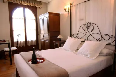 Cama o camas de una habitación en Hotel Merindad de Olite