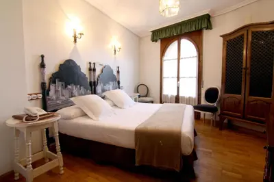 Cama o camas de una habitación en Hotel Merindad de Olite