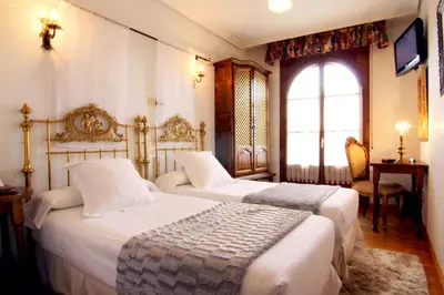 Cama o camas de una habitación en Hotel Merindad de Olite