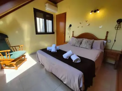 Cama o camas de una habitación en La Lucana Ordesa Ainsa apartamento