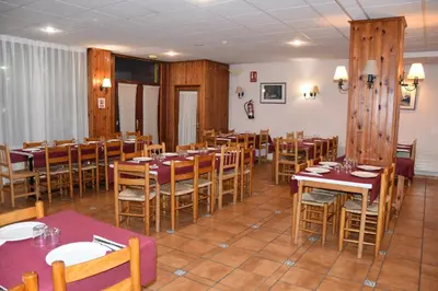 Un restaurante o sitio para comer en Hotel SNÖ Edelweiss
