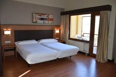 Cama o camas de una habitación en Hotel SNÖ Edelweiss