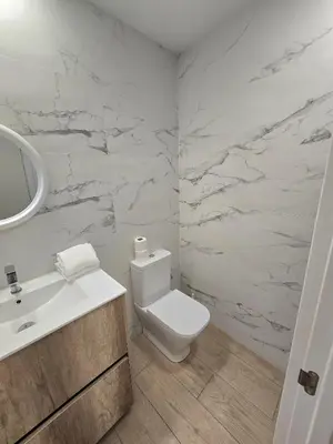 Un baño de SM Apartments