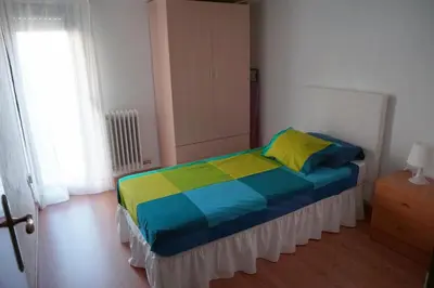 Cama o camas de una habitación en Apartamentos Turísticos Río Gallego (Apartamento Huesca)