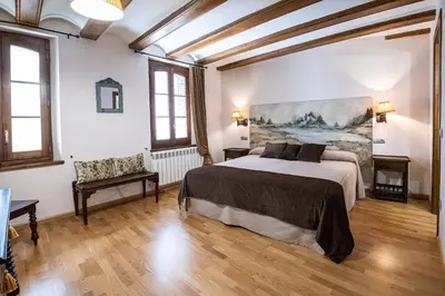 Cama o camas de una habitación en Apartamentos Casa Pichuana
