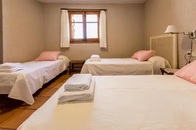 Cama o camas de una habitación en Casa Joan de Fontsagrada