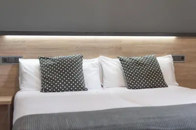 Cama o camas de una habitación en Alda Centro Pamplona