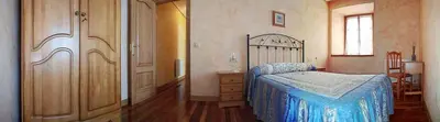 Cama o camas de una habitación en Palacio Lerruz I y Palacio Lerruz II