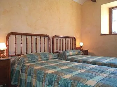 Cama o camas de una habitación en Palacio Lerruz I y Palacio Lerruz II